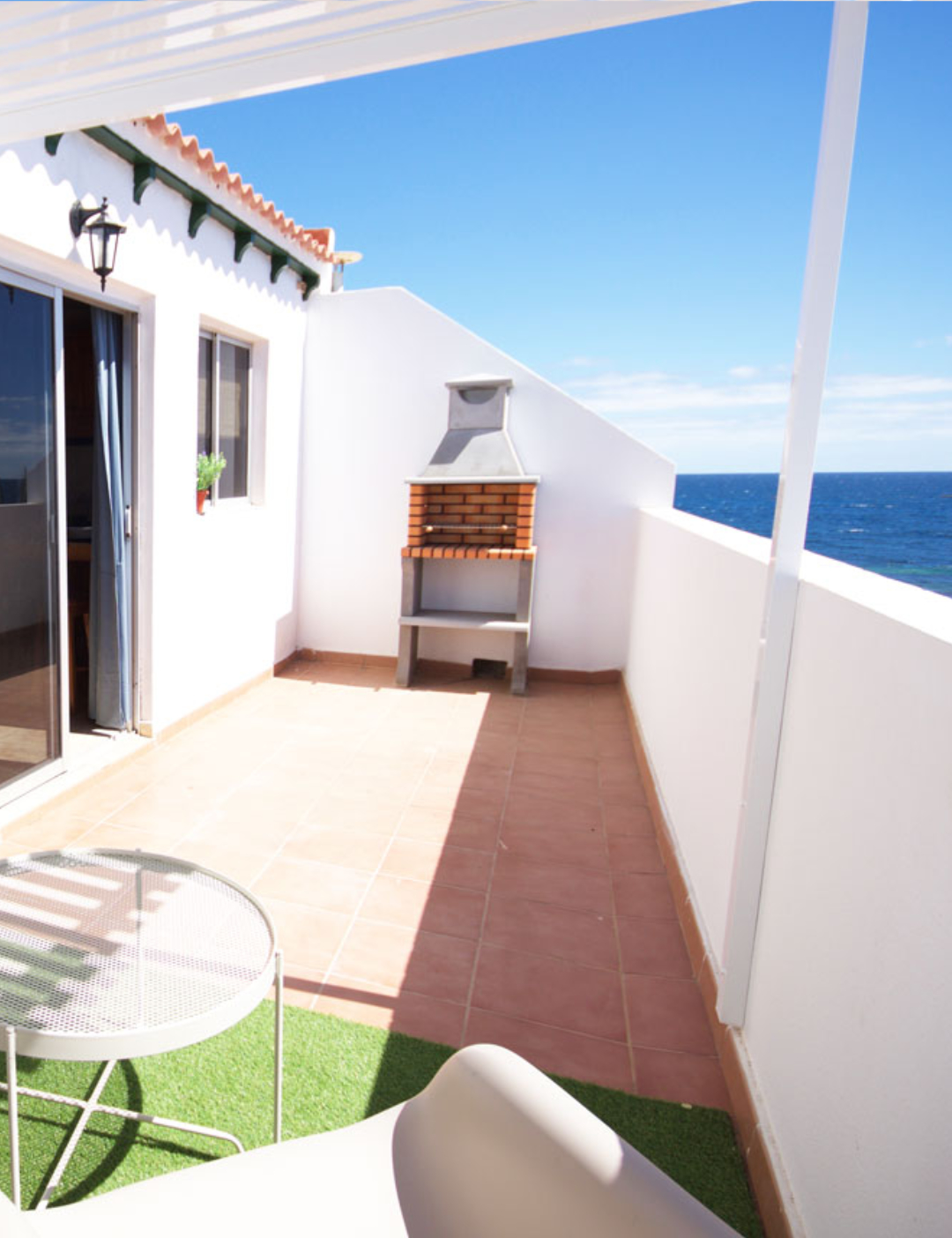 Terraza con mobiliario exterior y barbacoa Gran Canaria Stay El Burrero Gran Canaria